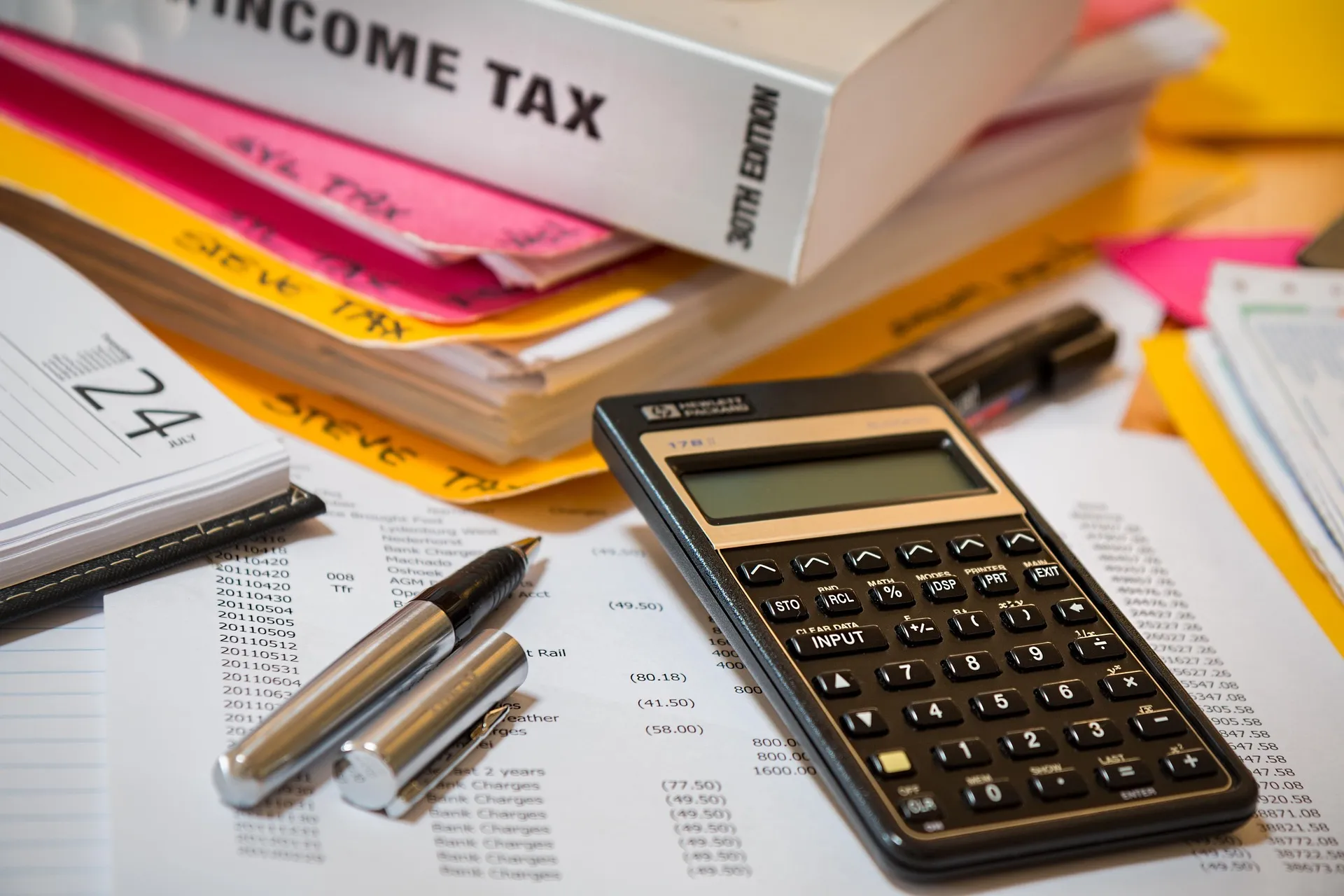 Documents and financial paperwork representing regulatory compliance
